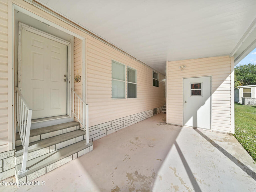 720 Periwinkle Circle, Barefoot Bay, FL 32976