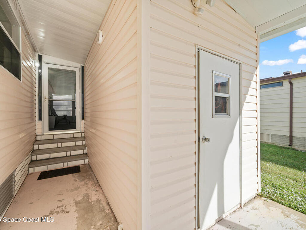 720 Periwinkle Circle, Barefoot Bay, FL 32976