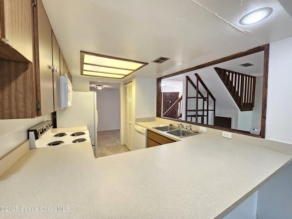 8779 Cocoa Court, Cape Canaveral, FL 32920