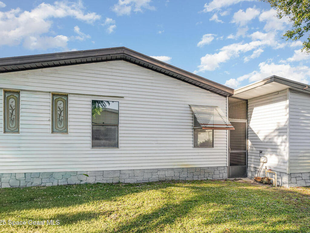 909 Dogwood Drive, Barefoot Bay, FL 32976