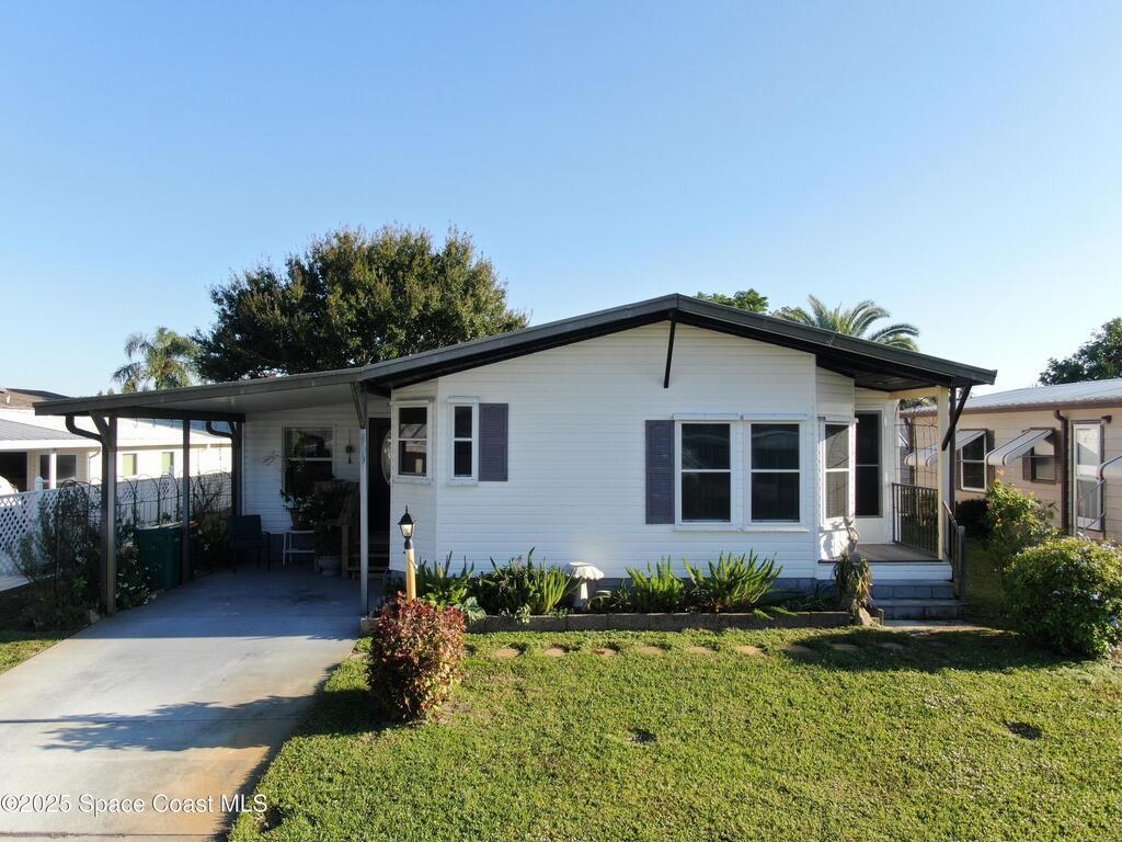 909 Dogwood Drive, Barefoot Bay, FL 32976