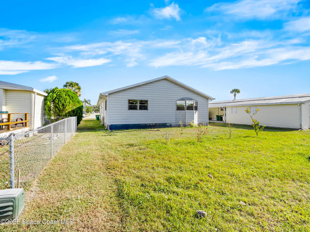 1040 Waterway Drive, Barefoot Bay, FL 32976