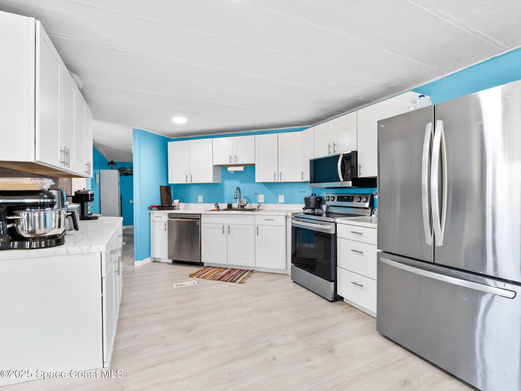 1040 Waterway Drive, Barefoot Bay, FL 32976