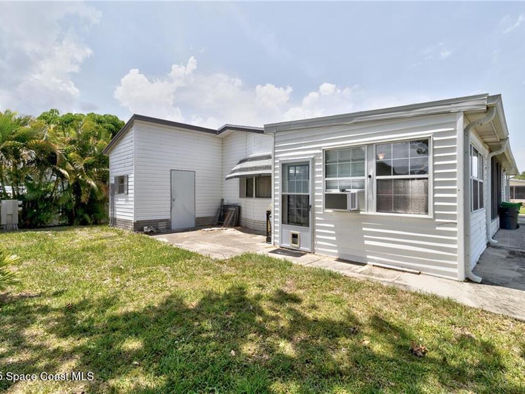 729 Gladiolus Drive, Barefoot Bay, FL 32976