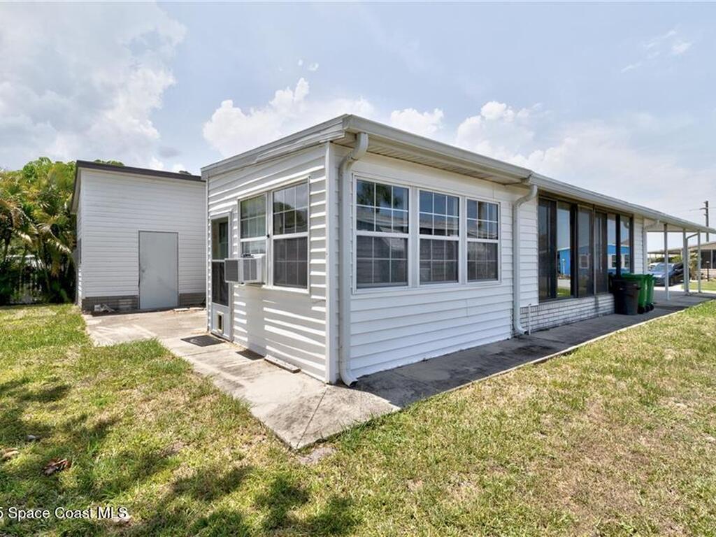 729 Gladiolus Drive, Barefoot Bay, FL 32976