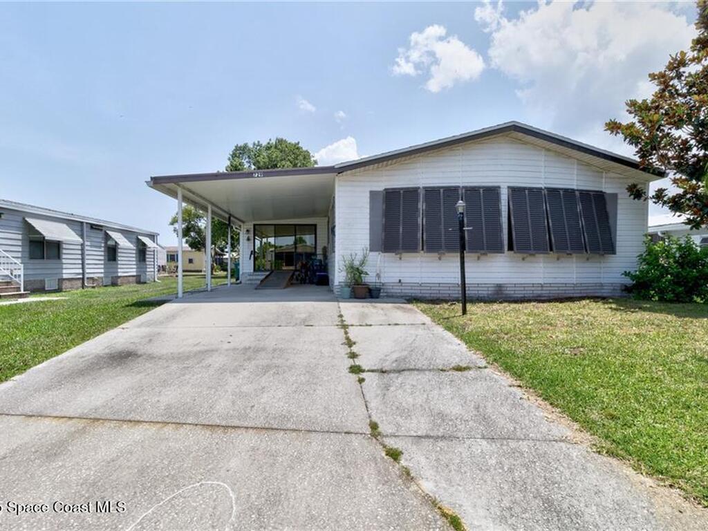 729 Gladiolus Drive, Barefoot Bay, FL 32976