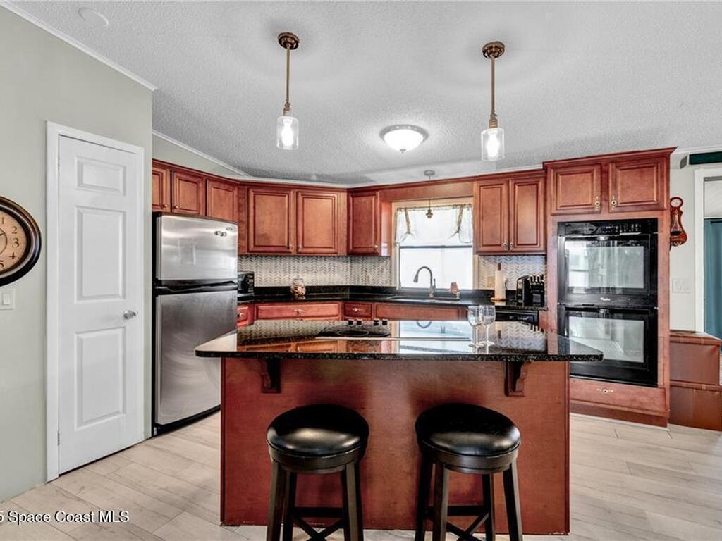 729 Gladiolus Drive, Barefoot Bay, FL 32976