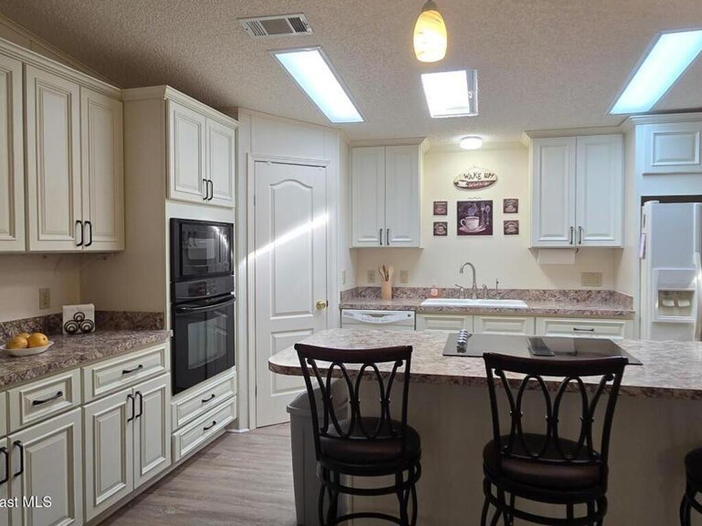 927 Yew Street, Barefoot Bay, FL 32976