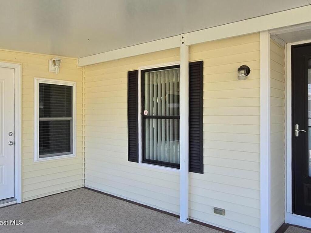 927 Yew Street, Barefoot Bay, FL 32976