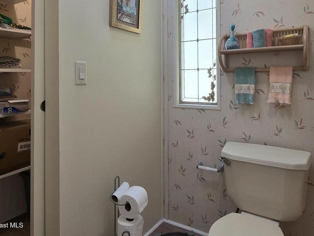 927 Yew Street, Barefoot Bay, FL 32976