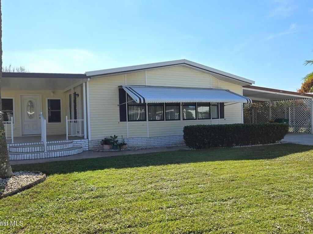 927 Yew Street, Barefoot Bay, FL 32976