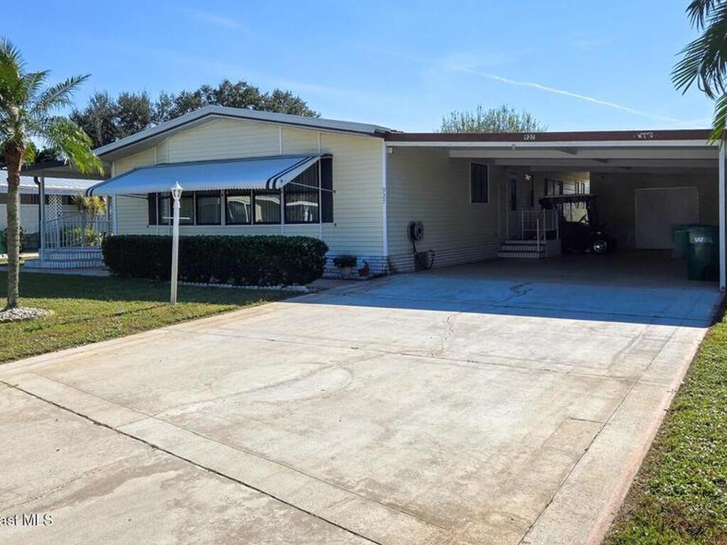927 Yew Street, Barefoot Bay, FL 32976