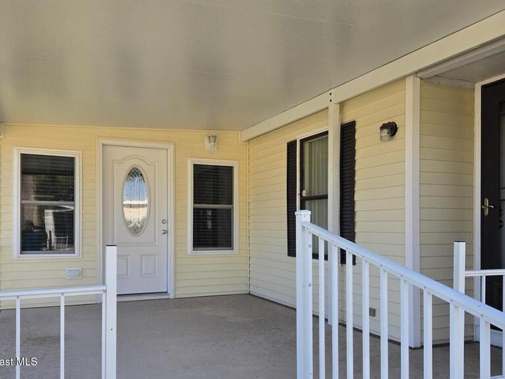 927 Yew Street, Barefoot Bay, FL 32976