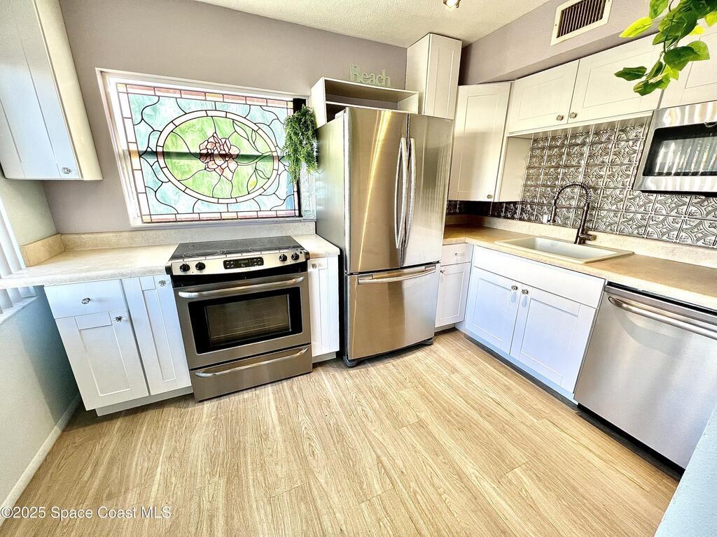 7165 Ridgewood Avenue, Cape Canaveral, FL 32920