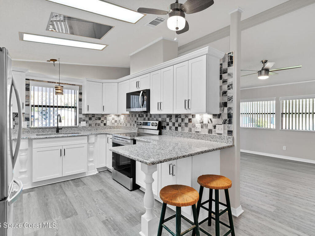 658 SE Marlin Circle, Barefoot Bay, FL 32976