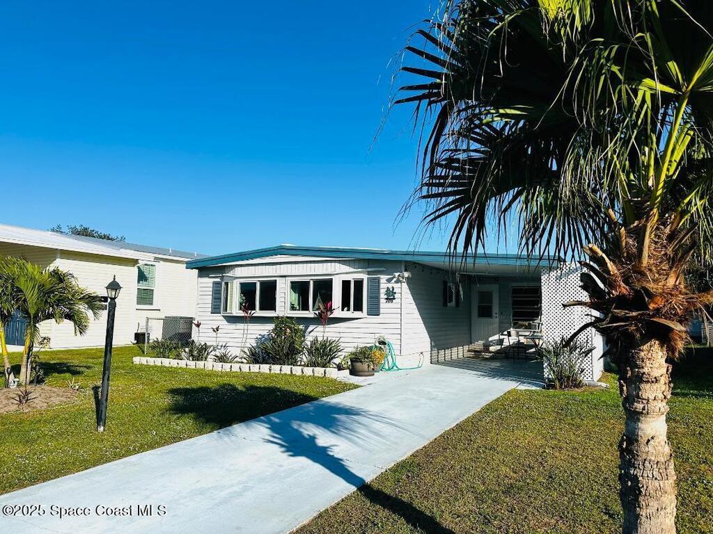 708 Lark Drive, Barefoot Bay, FL 32976