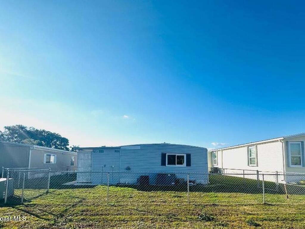 708 Lark Drive, Barefoot Bay, FL 32976