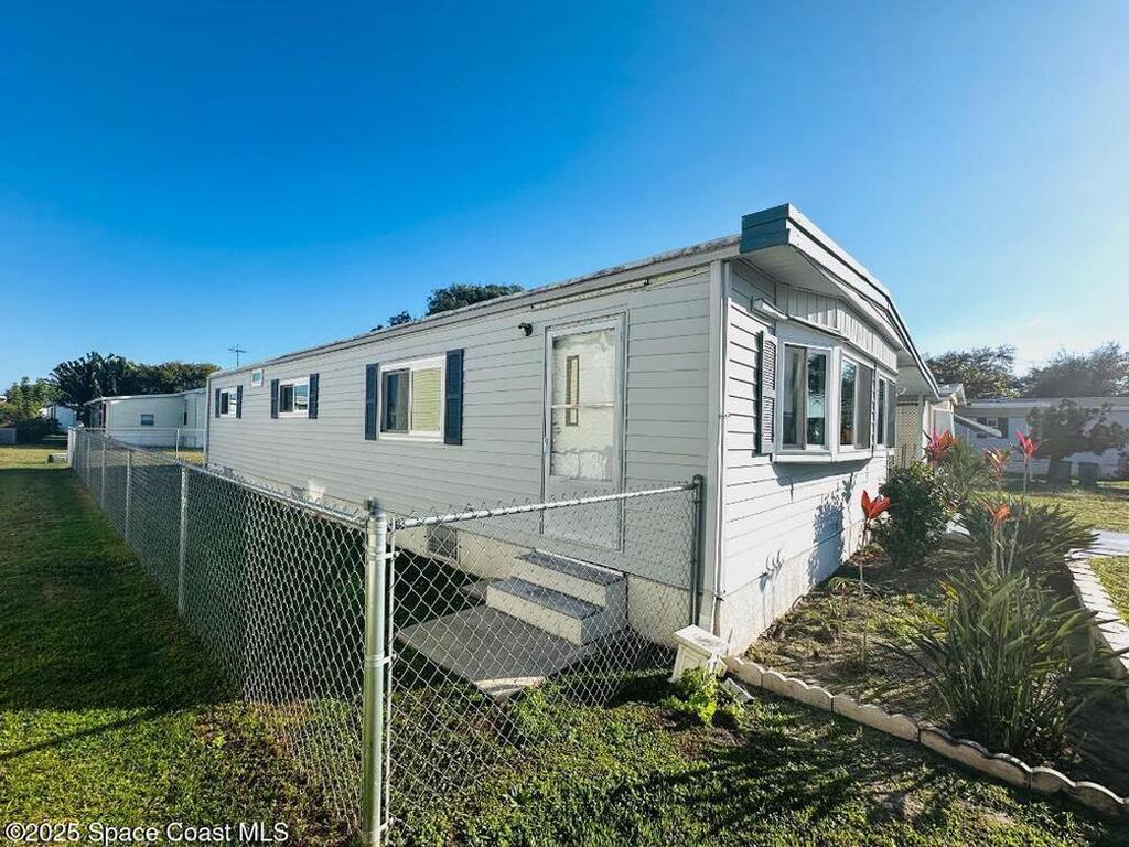 708 Lark Drive, Barefoot Bay, FL 32976