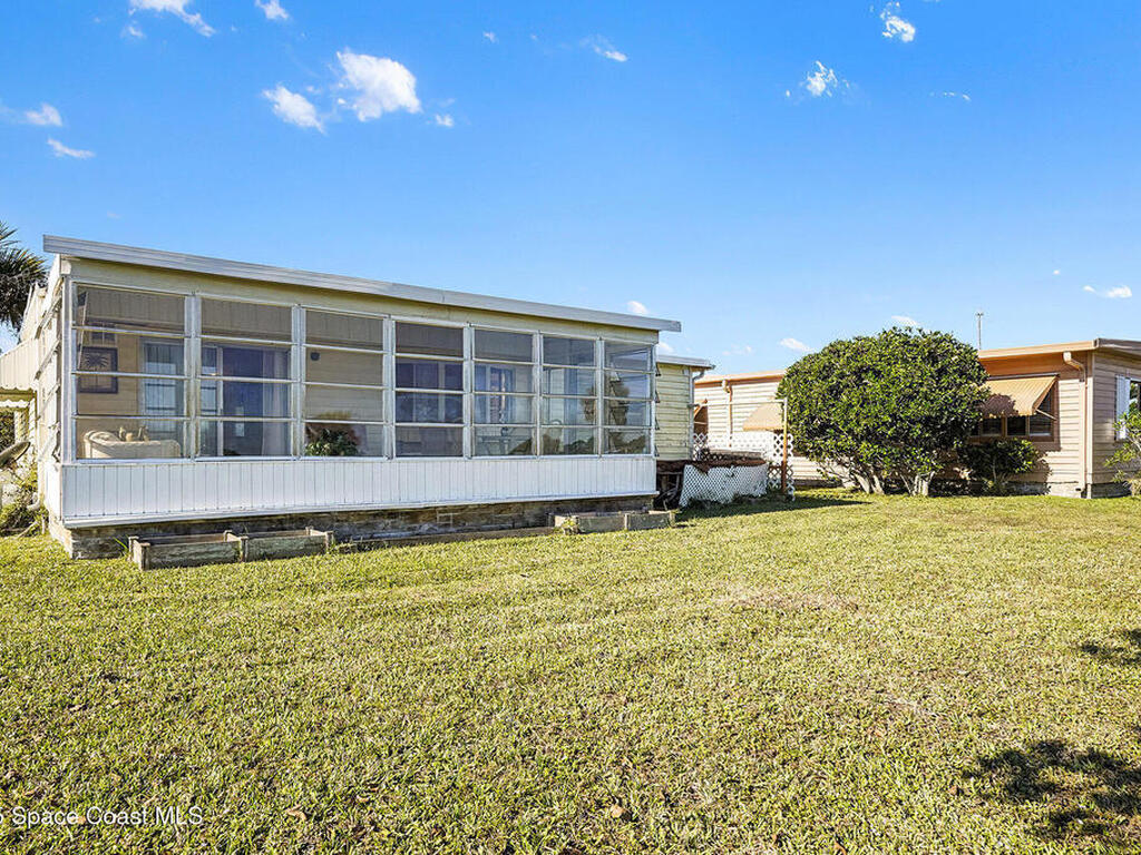 1120 Barefoot Bay Circle, Micco, FL 32976