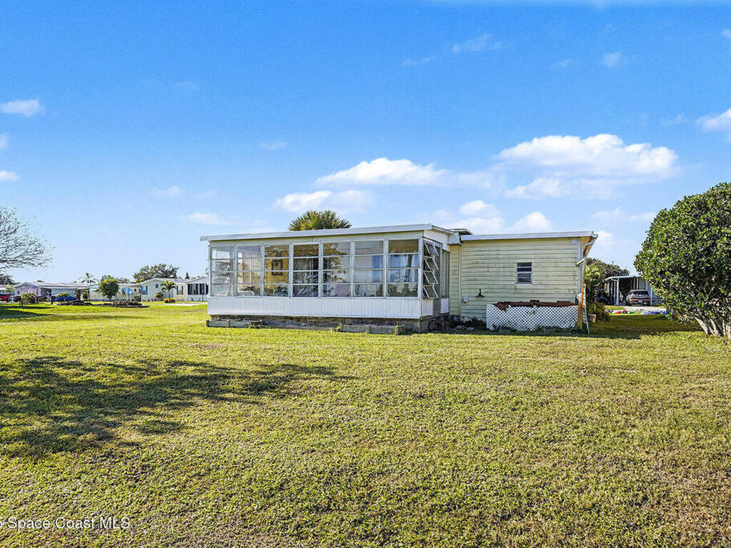 1120 Barefoot Bay Circle, Micco, FL 32976