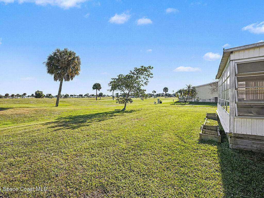 1120 Barefoot Bay Circle, Micco, FL 32976