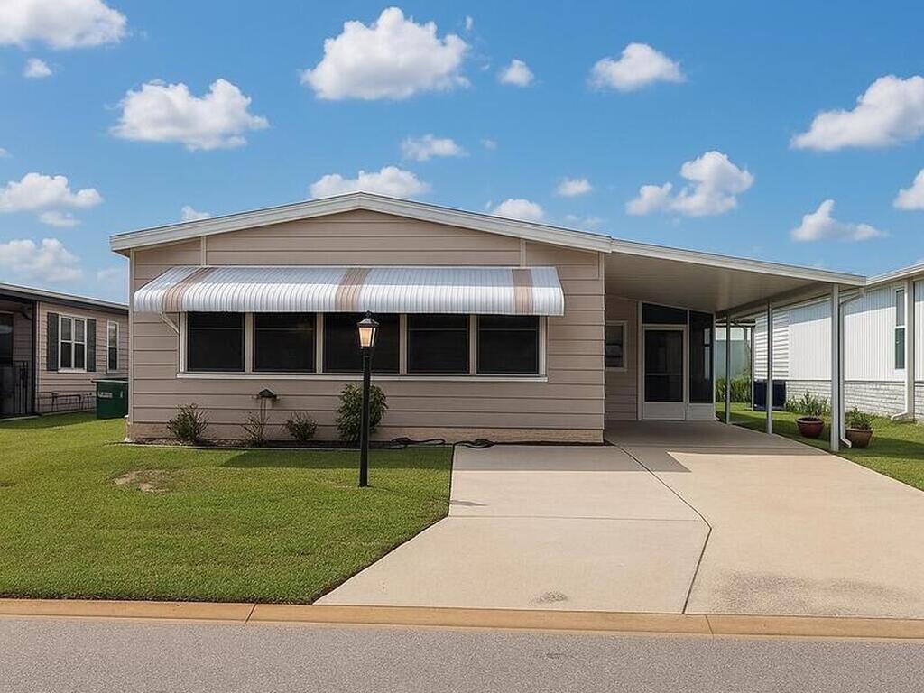 637 Wedelia Drive, Barefoot Bay, FL 32976