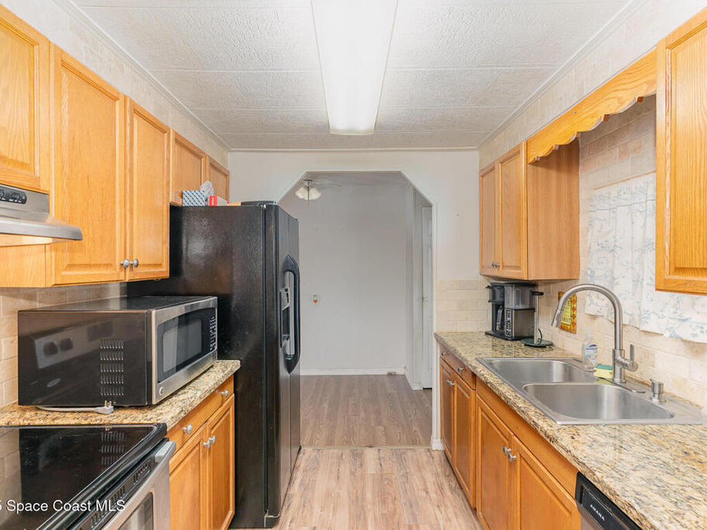 637 Wedelia Drive, Barefoot Bay, FL 32976