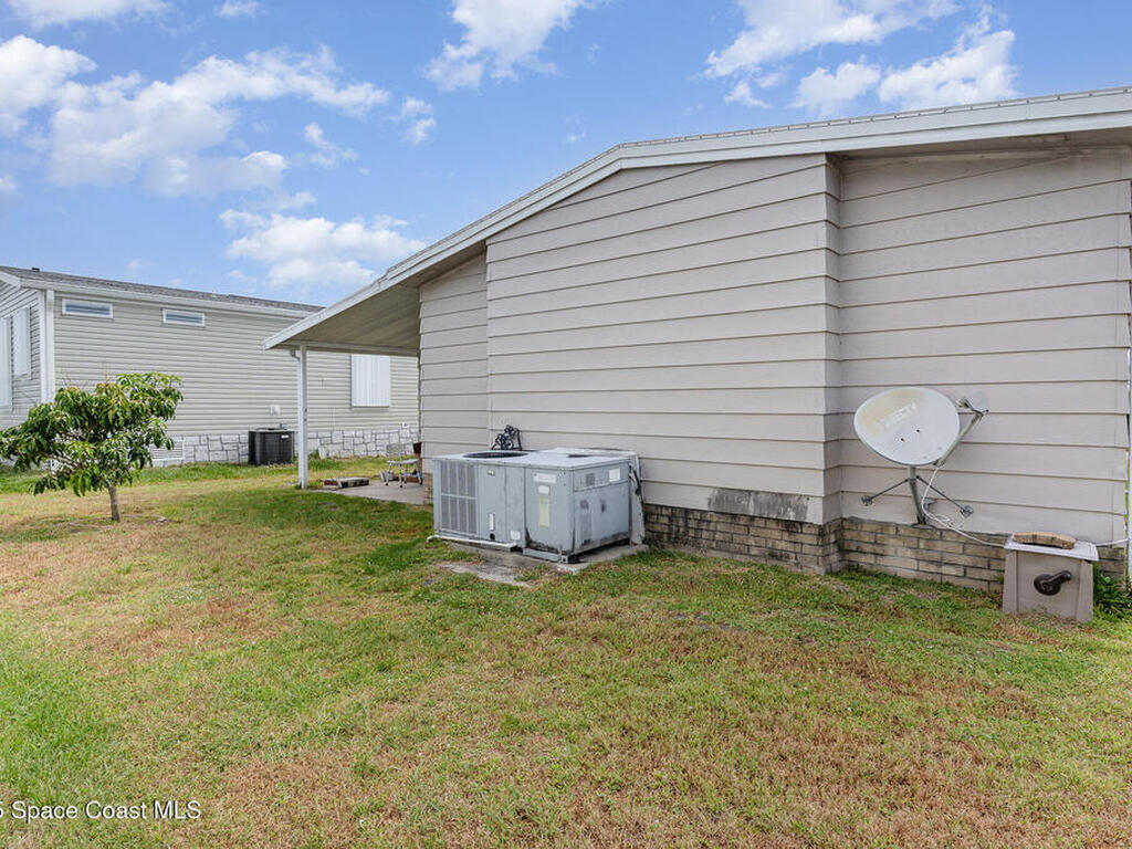 637 Wedelia Drive, Barefoot Bay, FL 32976