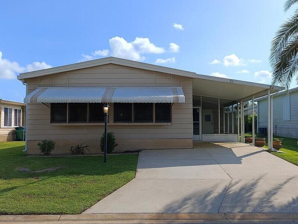 637 Wedelia Drive, Barefoot Bay, FL 32976