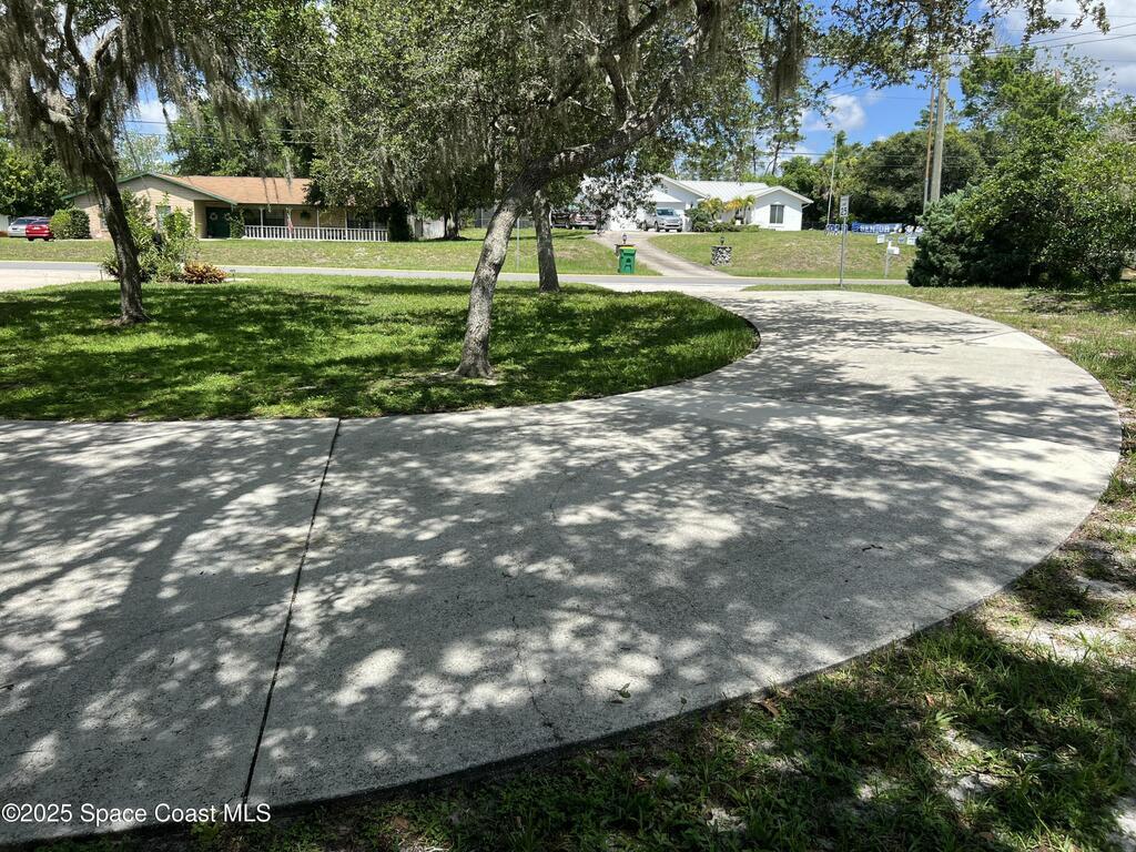 6031 Barna Avenue, Titusville, FL 32780