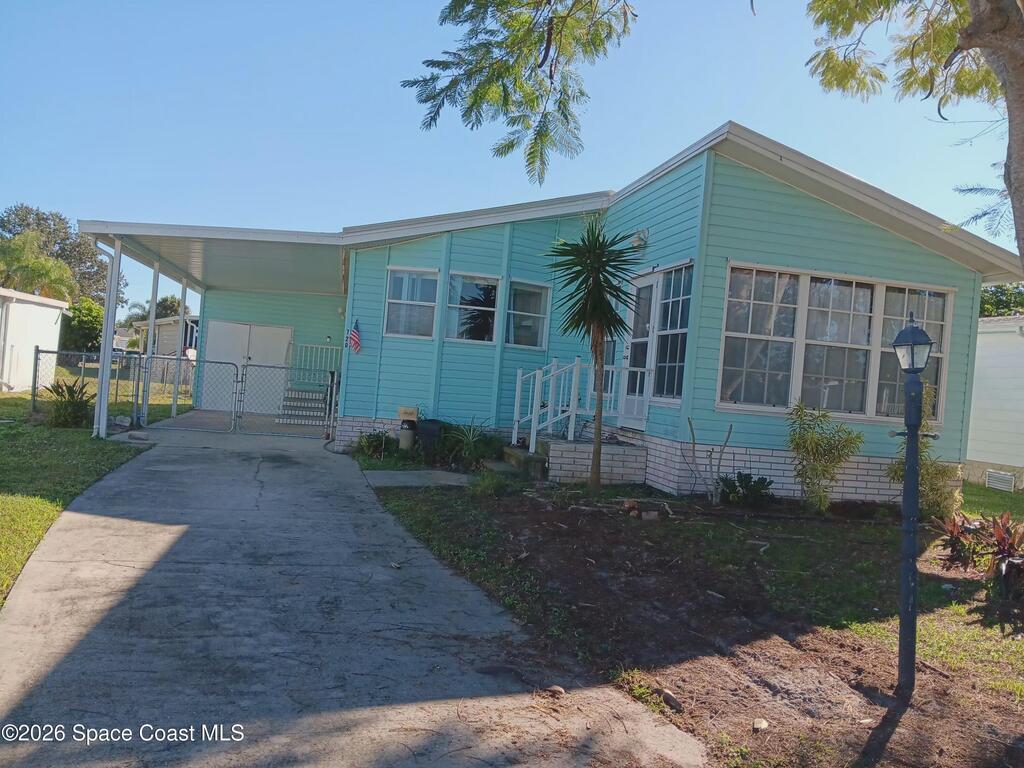 720 Lark Drive, Barefoot Bay, FL 32976