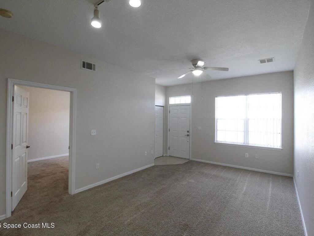 105 Turpial Way, Melbourne, FL 32901