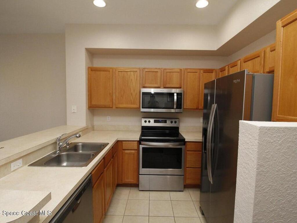 105 Turpial Way, Melbourne, FL 32901