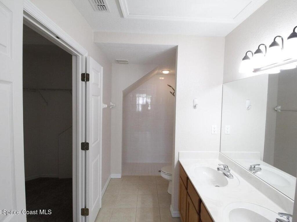 105 Turpial Way, Melbourne, FL 32901