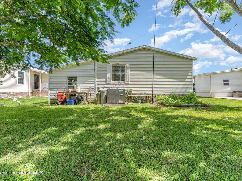 1115 Barefoot Circle, Barefoot Bay, FL 32976