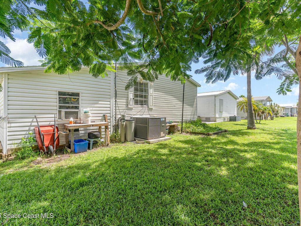 1115 Barefoot Circle, Barefoot Bay, FL 32976