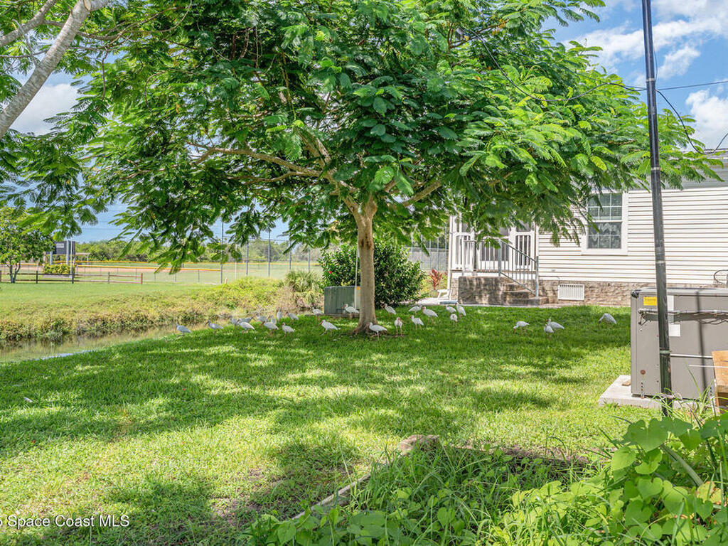 1115 Barefoot Circle, Barefoot Bay, FL 32976