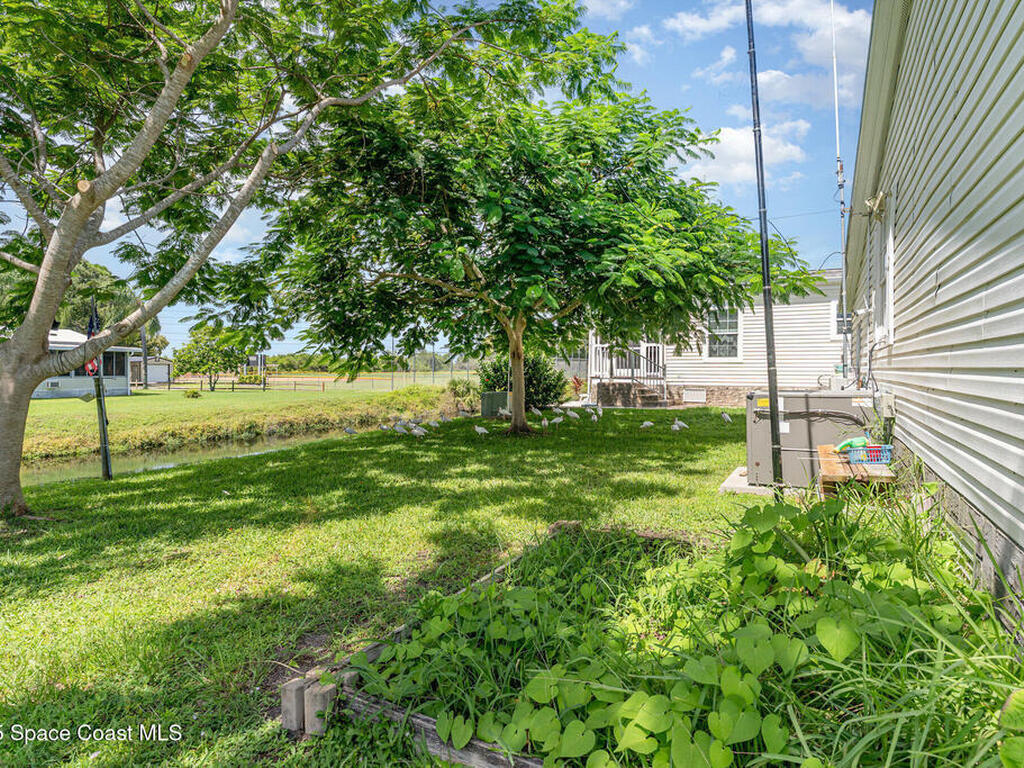 1115 Barefoot Circle, Barefoot Bay, FL 32976