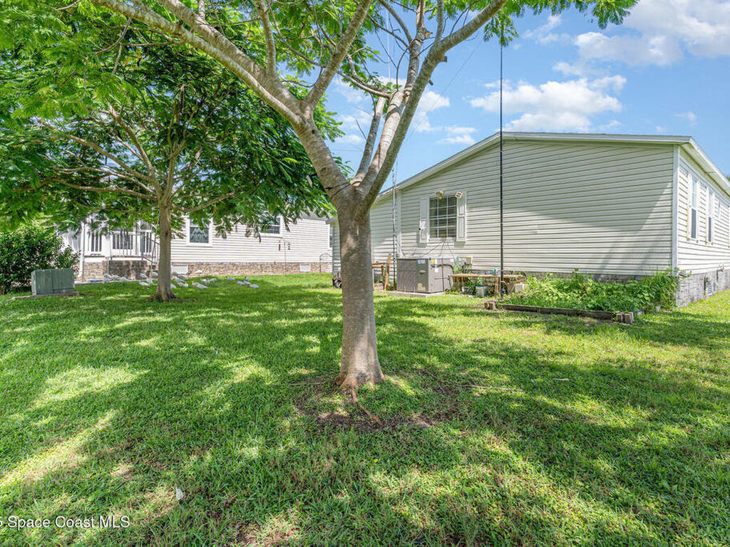 1115 Barefoot Circle, Barefoot Bay, FL 32976