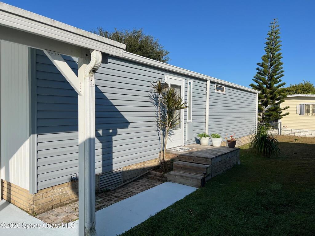 1076 Royal Palm Drive, Barefoot Bay, FL 32976