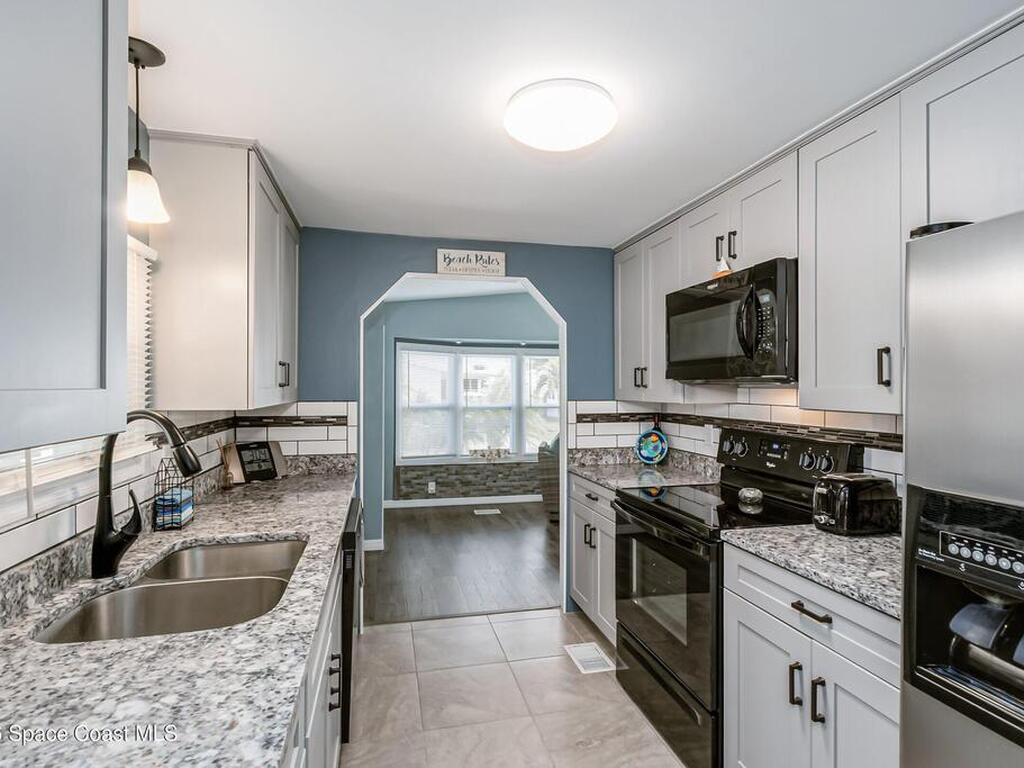 914 Hyacinth Circle, Barefoot Bay, FL 32976