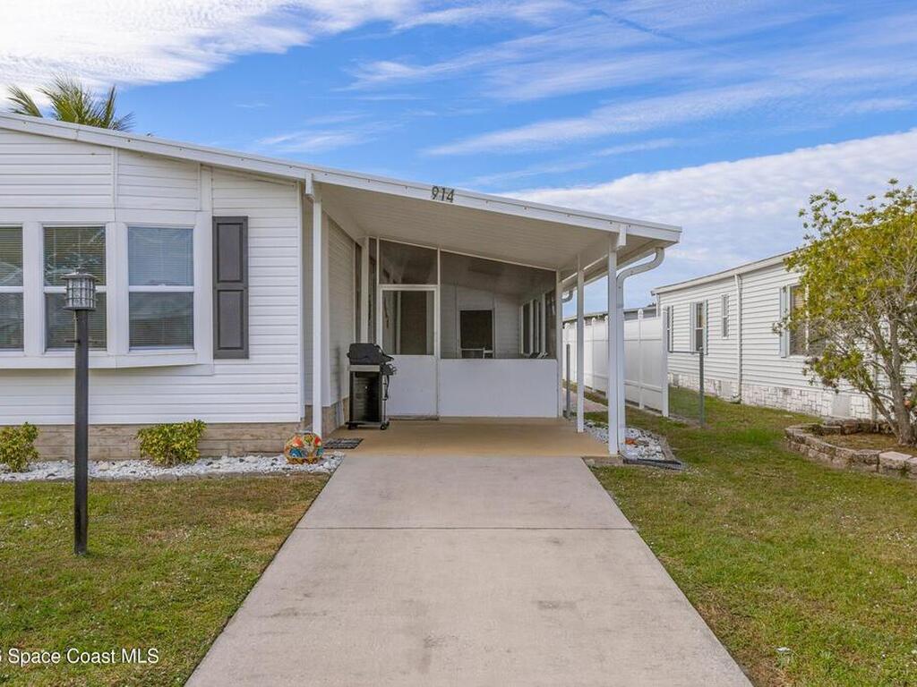 914 Hyacinth Circle, Barefoot Bay, FL 32976