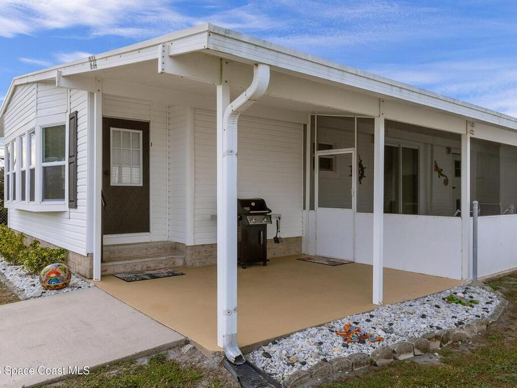 914 Hyacinth Circle, Barefoot Bay, FL 32976