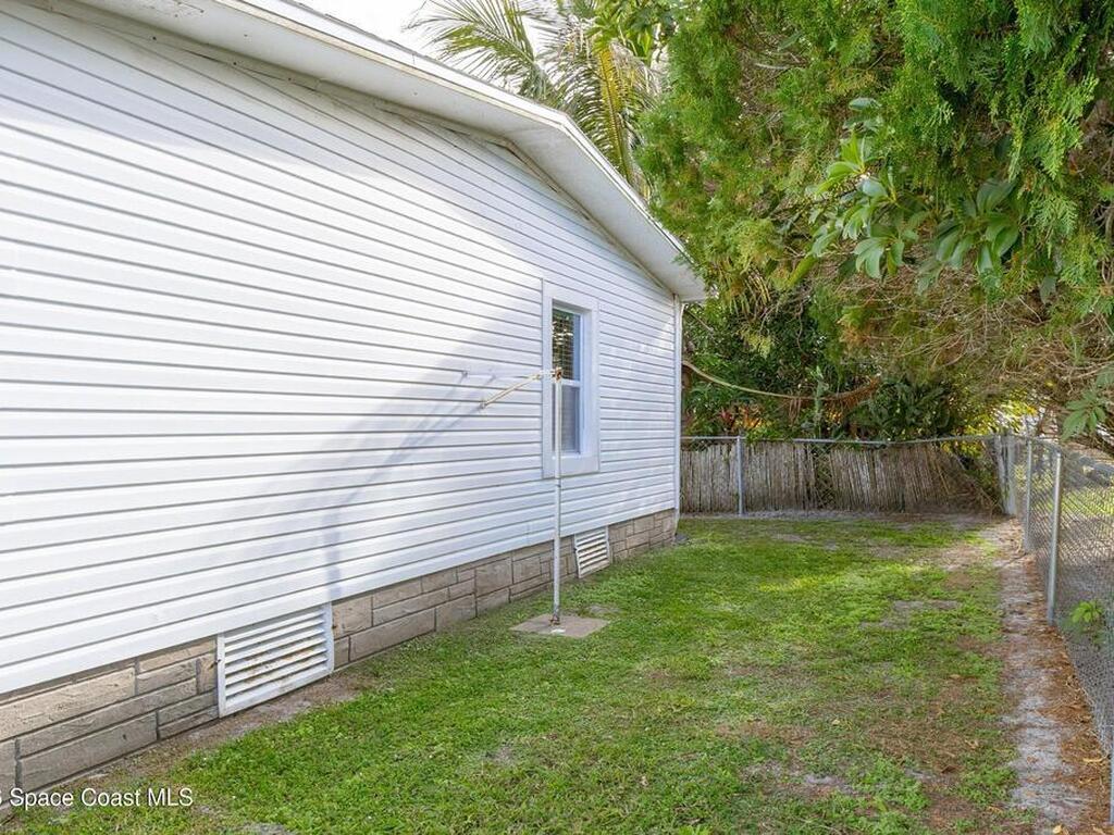 914 Hyacinth Circle, Barefoot Bay, FL 32976