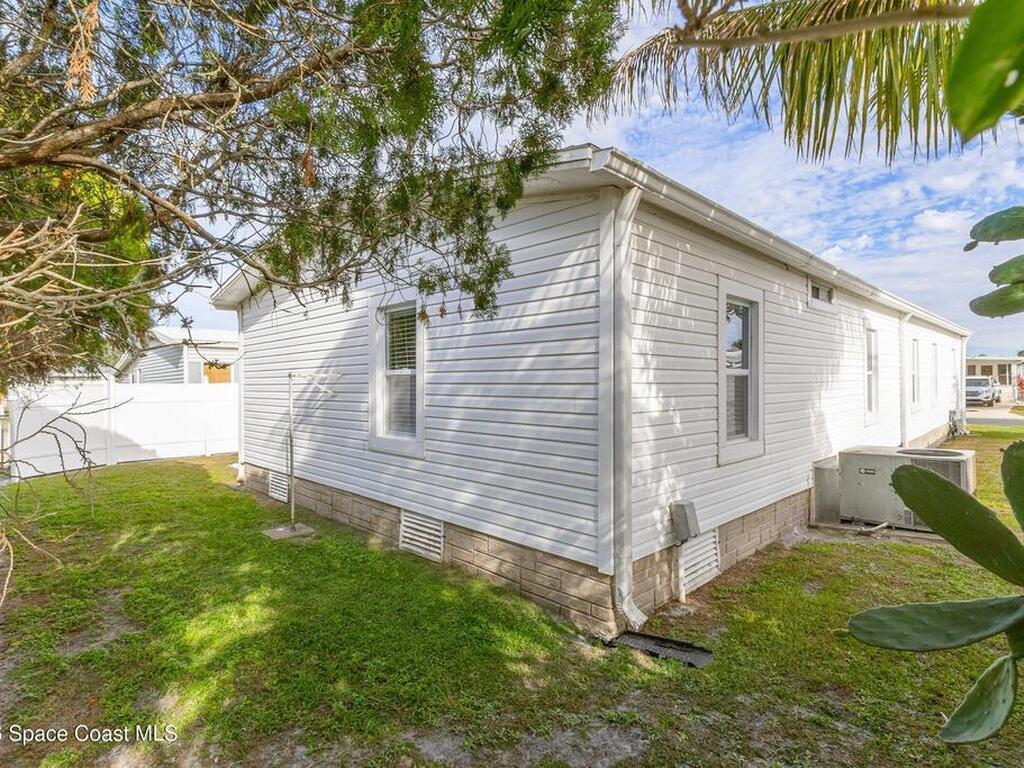 914 Hyacinth Circle, Barefoot Bay, FL 32976