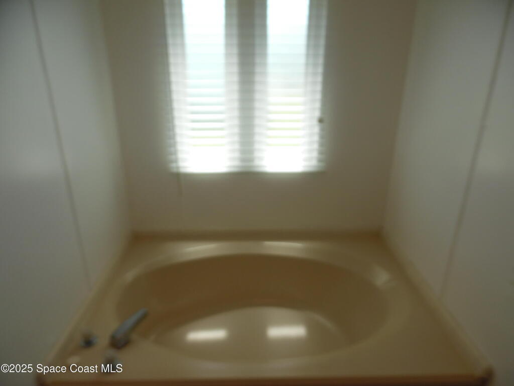 503 Puffin Drive, Barefoot Bay, FL 32976