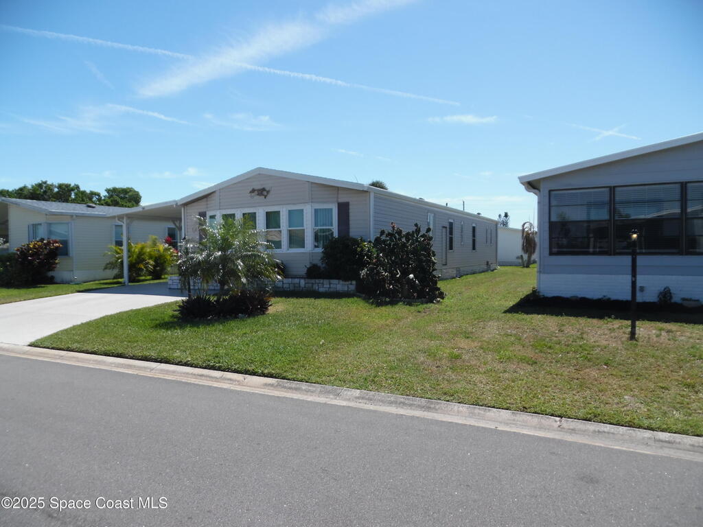 503 Puffin Drive, Barefoot Bay, FL 32976