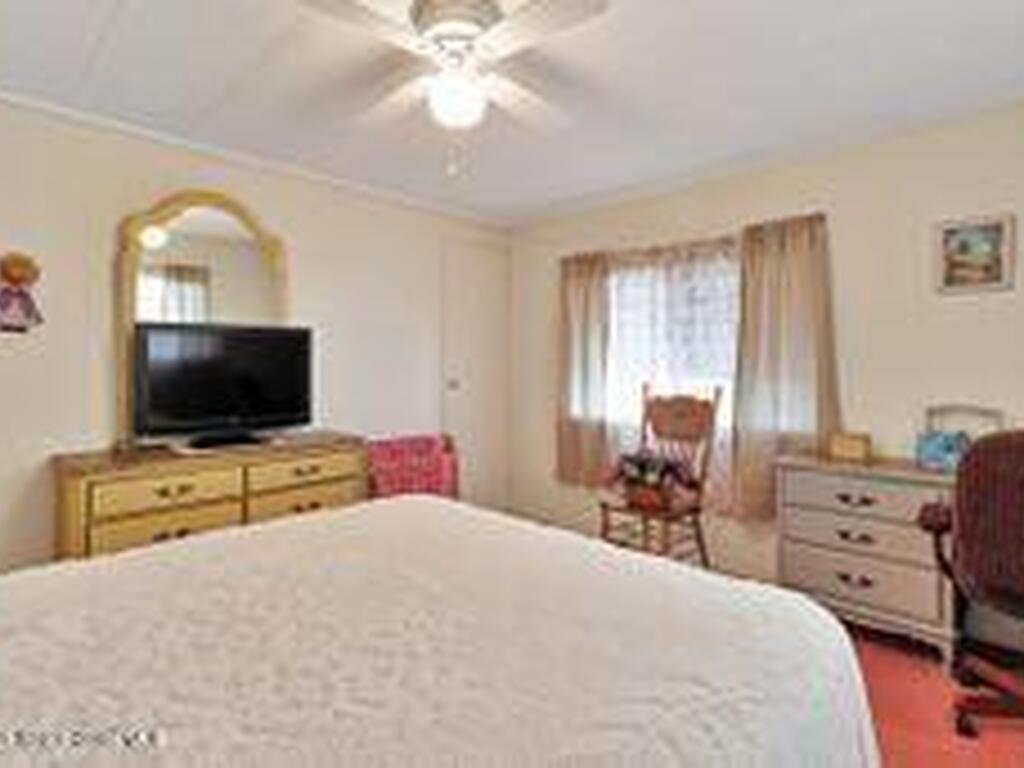 807 W Wren Circle, Barefoot Bay, FL 32976