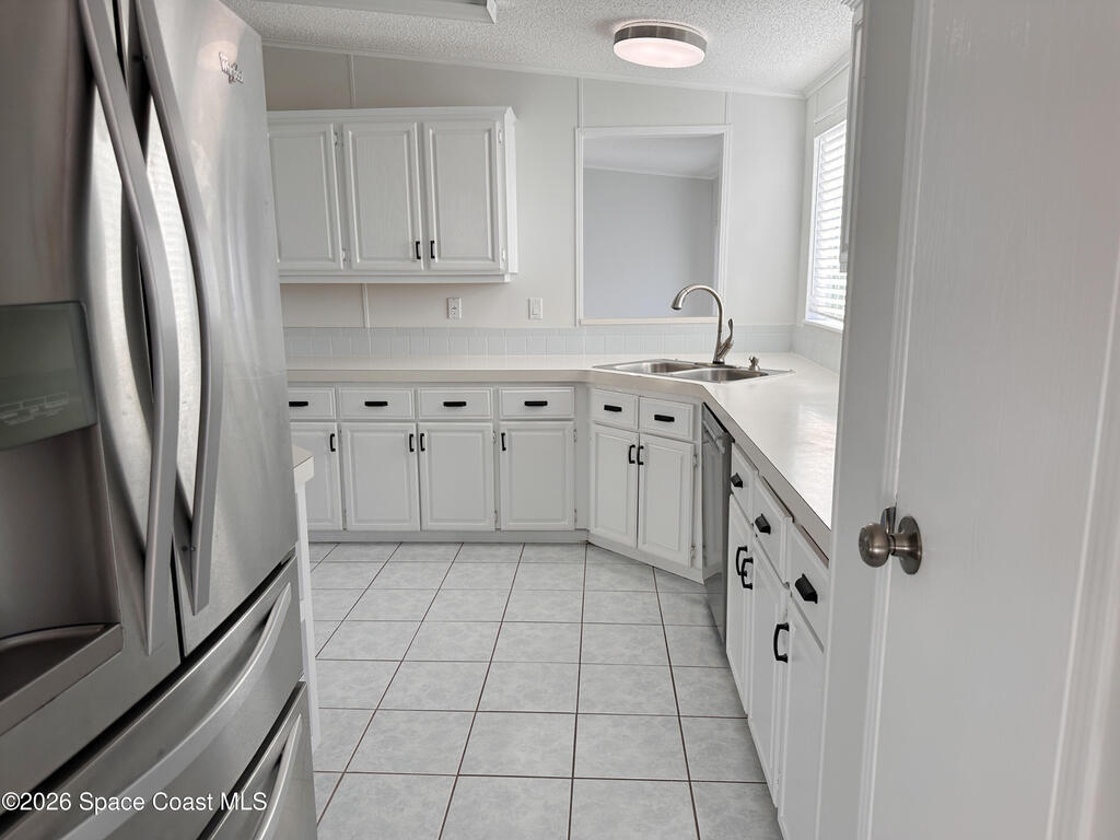 606 Dolphin Circle, Barefoot Bay, FL 32976