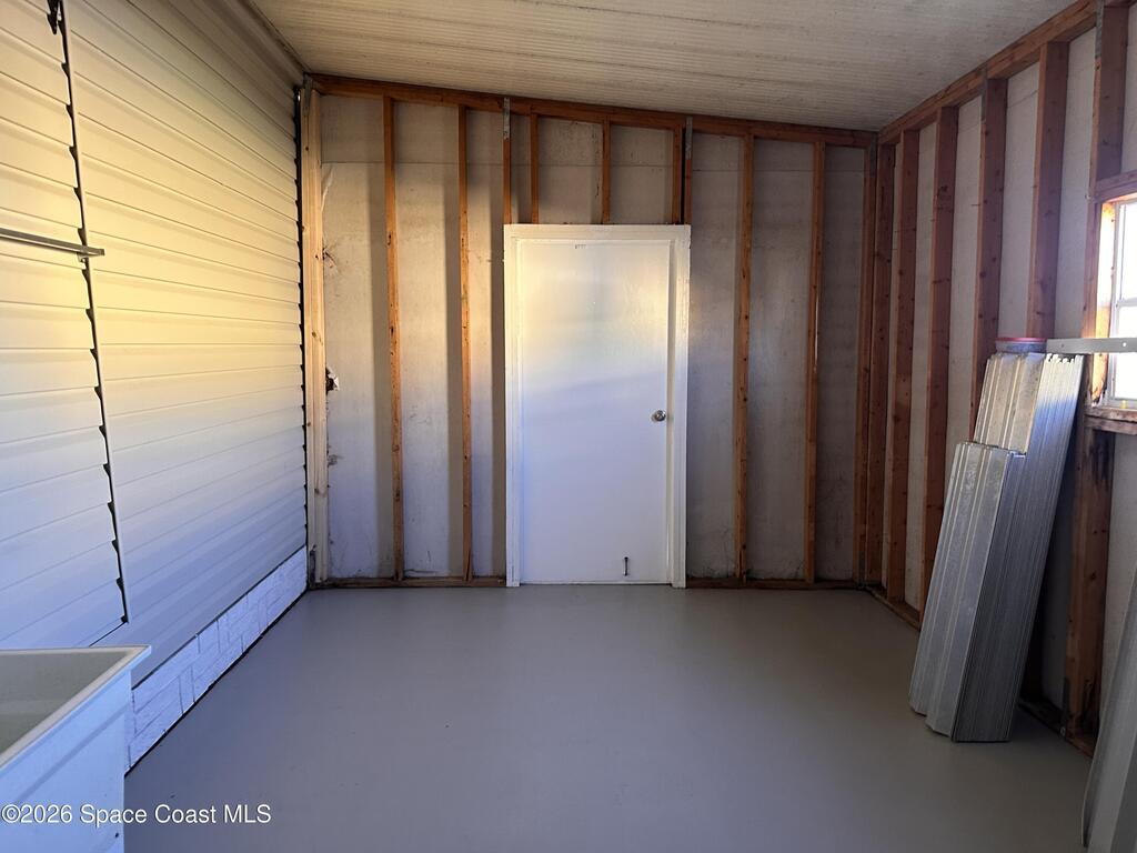 606 Dolphin Circle, Barefoot Bay, FL 32976